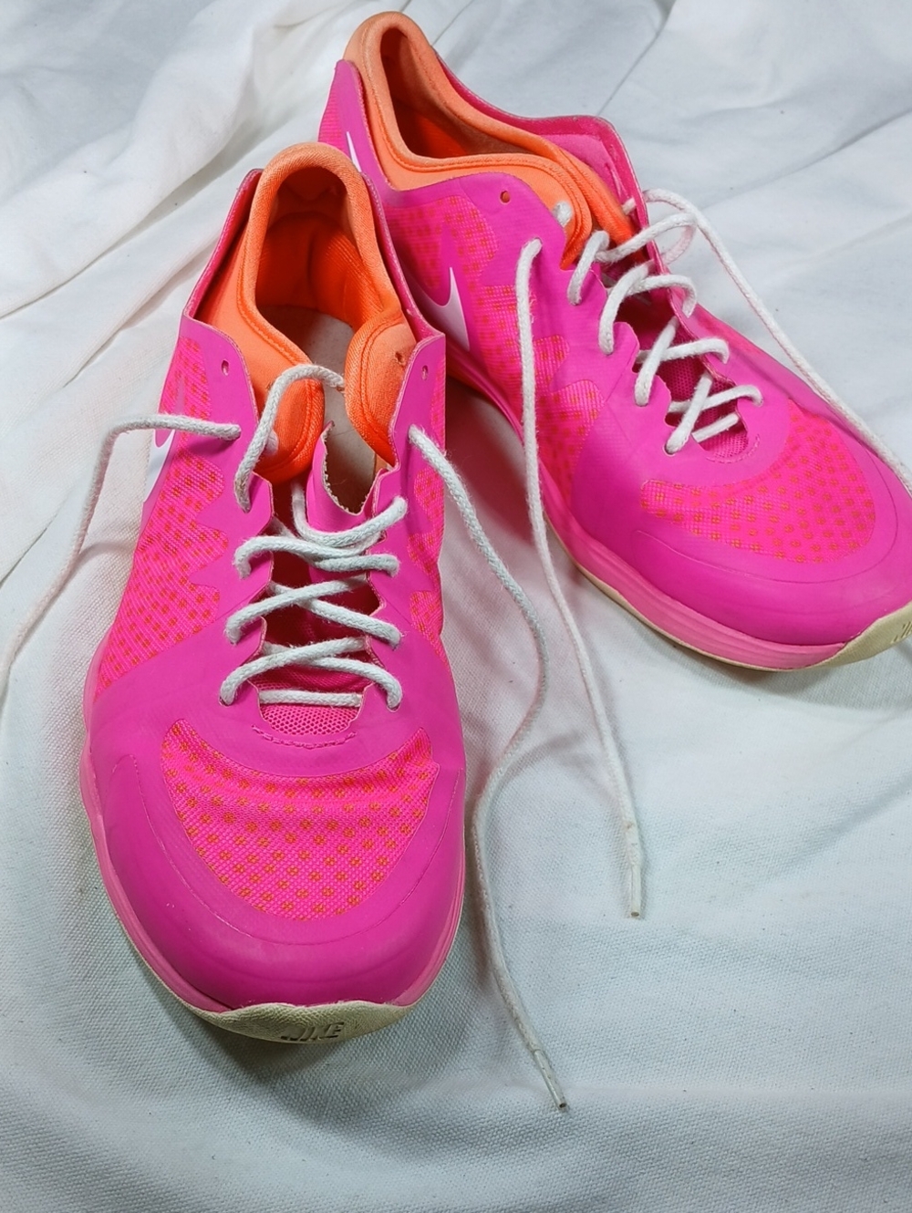Nike Women's Hot Pink Running Shoes with Orange Interior